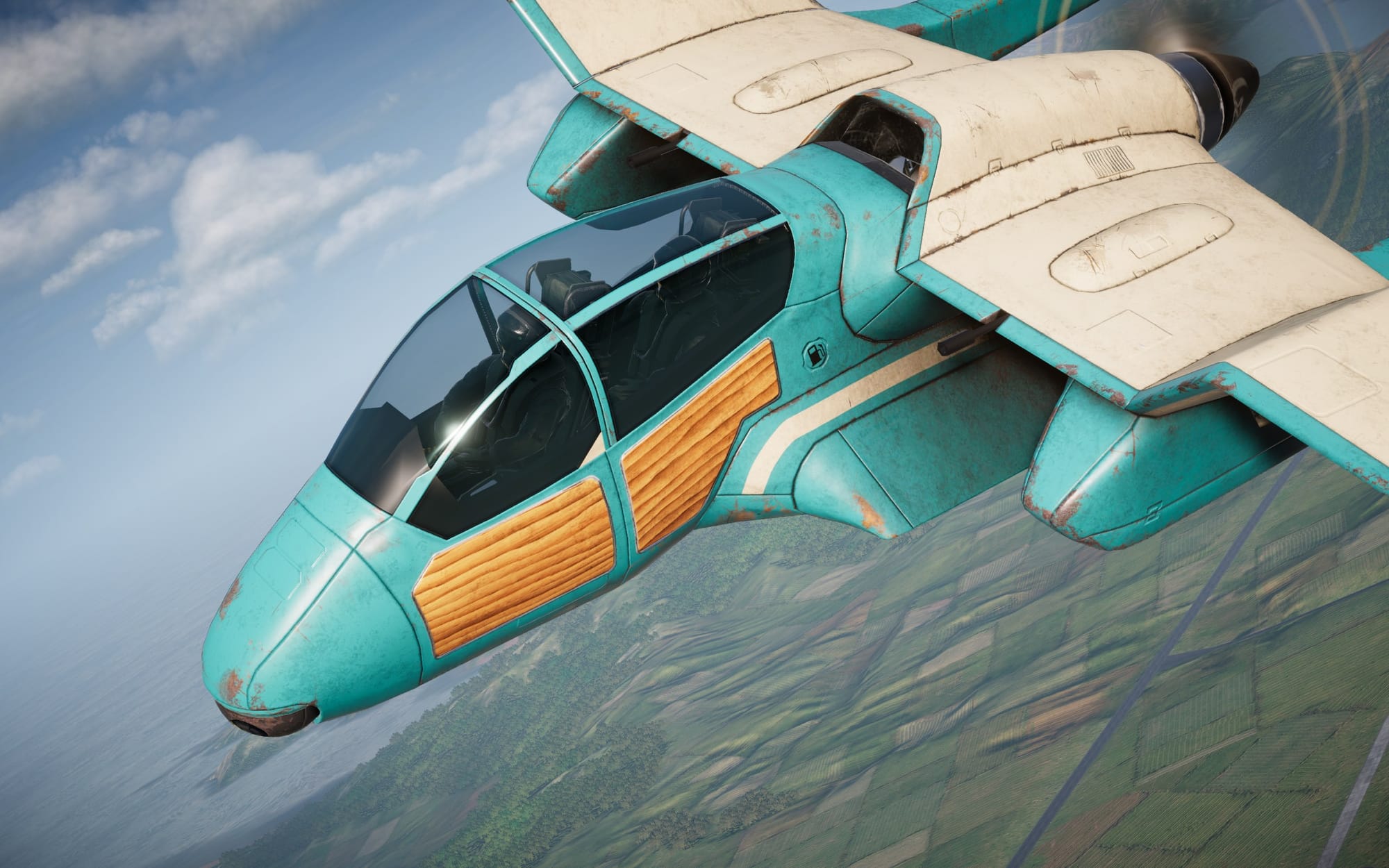 Teal and beige fighter plane